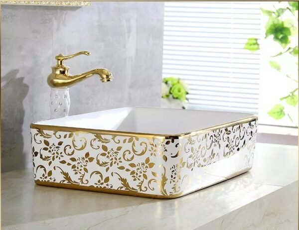 Wastafel cuci tangan keramik fleur de lis desain ornamen dan lis emas